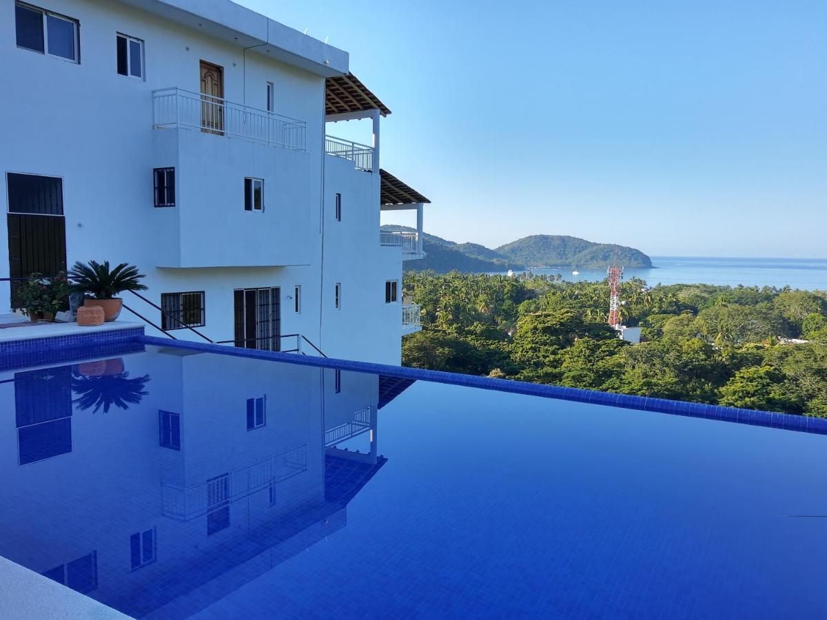 Sunset House Zihuatanejo Aparthotel Bagian luar foto