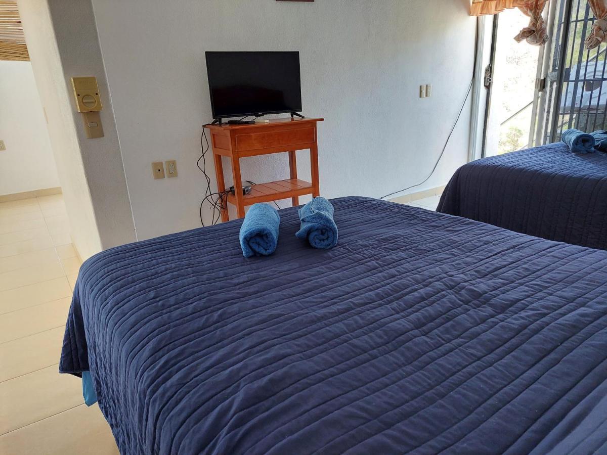 Sunset House Zihuatanejo Aparthotel Bagian luar foto